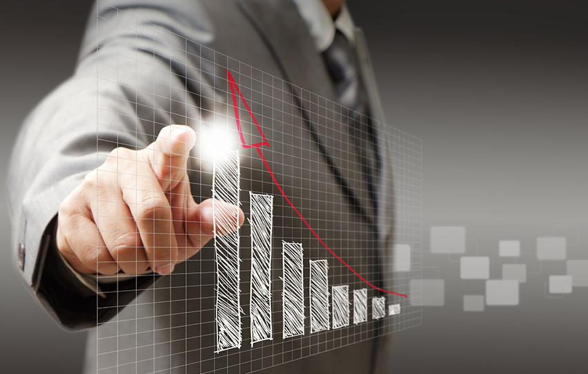 A hand interacting with business data and charts